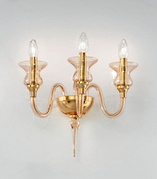Sconce with amber decoration at three lights