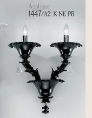 Two lights, black wall light, lead pendants, chrome metal finishes.