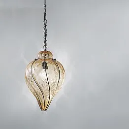 Suspended lamp in submerged amber glass